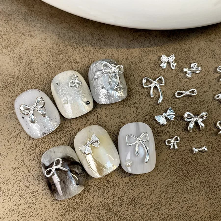 10 pz/borsa fiocco di lusso nail art charms lega 3D papillon gioielli decorazione strass per unghie accessori fai da te