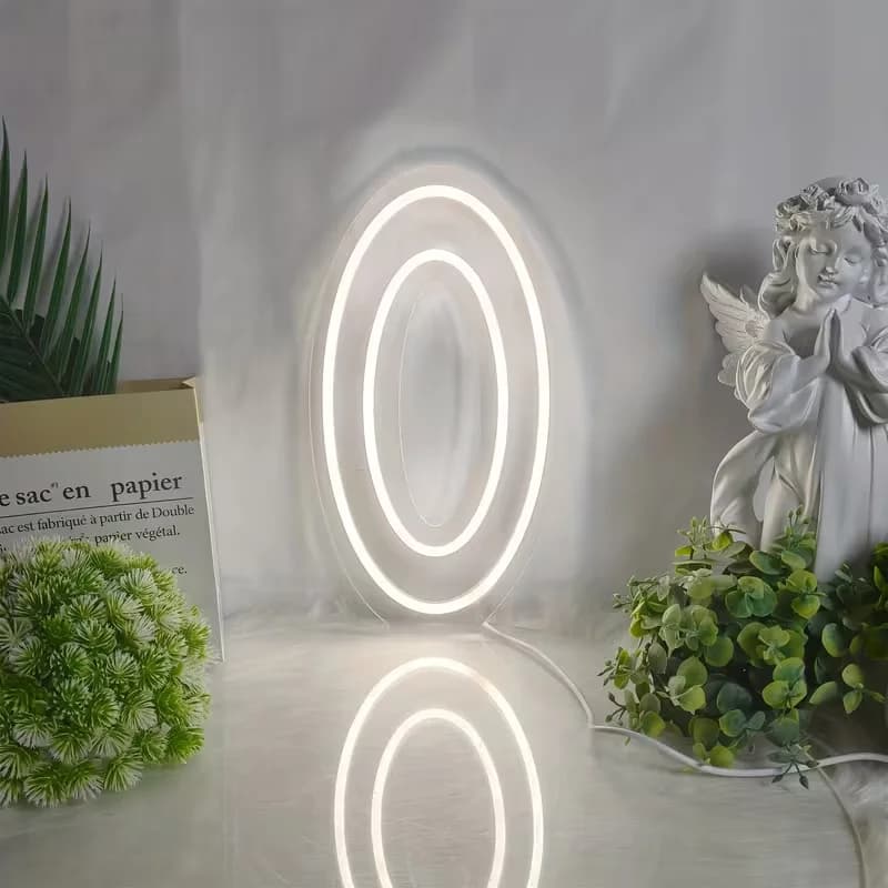 Un insegna al neon a LED bianca con numeri da 0 a 9, alimentata tramite USB e dotata di interruttore dimmer, perfetta per la decorazione della parete