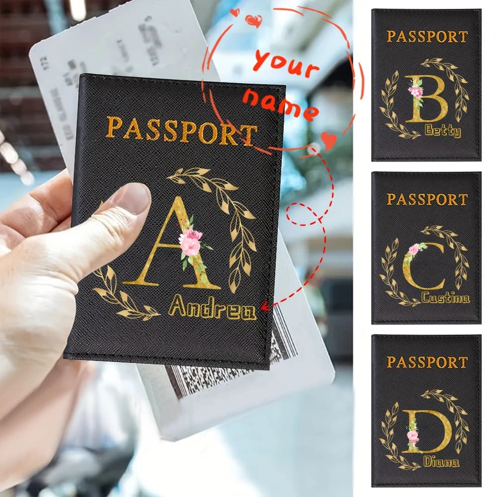 Floral personalized passport holder with name/initials. Slim black design, holds cards, practical travel accessory.