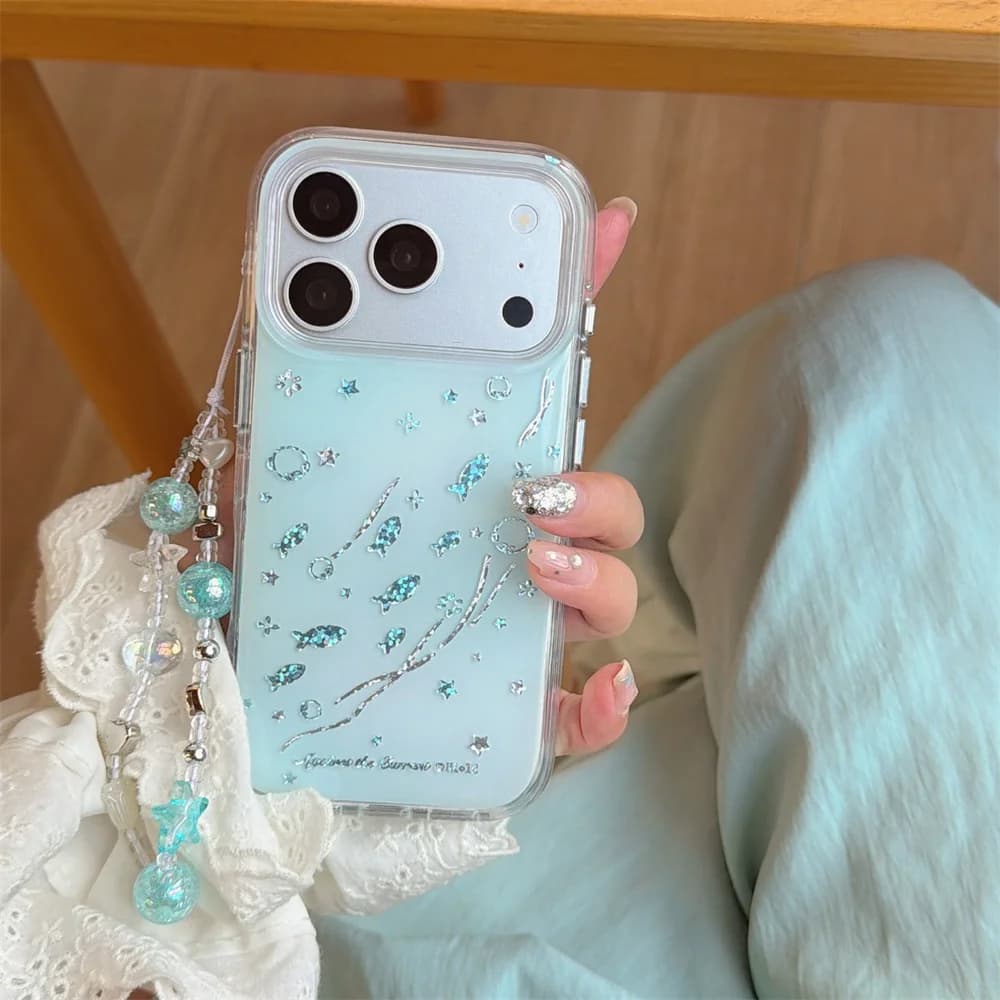 Custodia per telefono INS con stelle marinae dorate e glitter per iPhone 15 14 13 15 Pro, 16 Pro, 17 Pro Max, con catena, simpatica e antiurto
