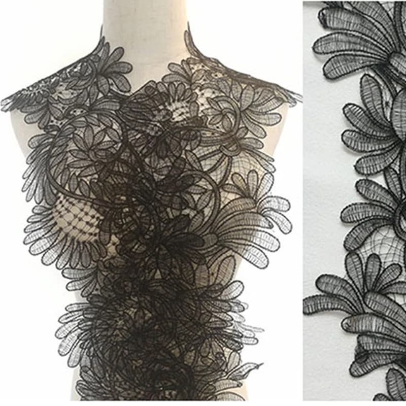 Tessuto con rifiniture in pizzo bianco e nero per cucire abiti da sposa in pizzo artigianale