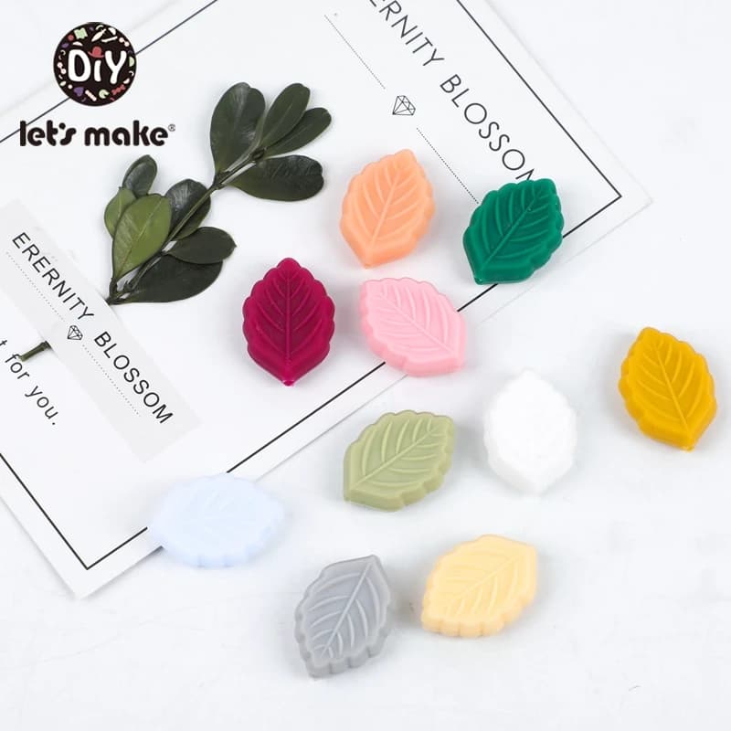 Facciamo 30 pezzi piccole foglie Silicone massaggiagengive prodotto per allattamento orale massaggiagengive in Silicone colore casuale