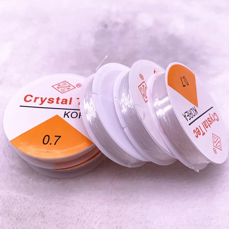 A flexible crystal stretch rope roll for jewelry creation, bracelet with beads, fishing wire