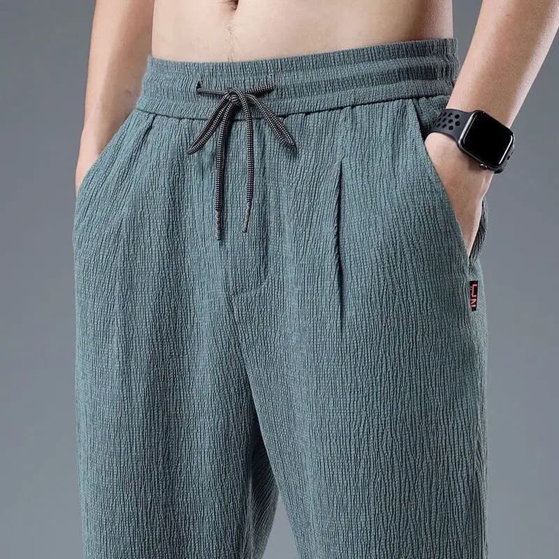 Pantaloni estivi da uomo in lino da jogging in seta di ghiaccio Pantaloni sportivi larghi estivi casual Pantaloni Harem da uomo leggeri primaverili