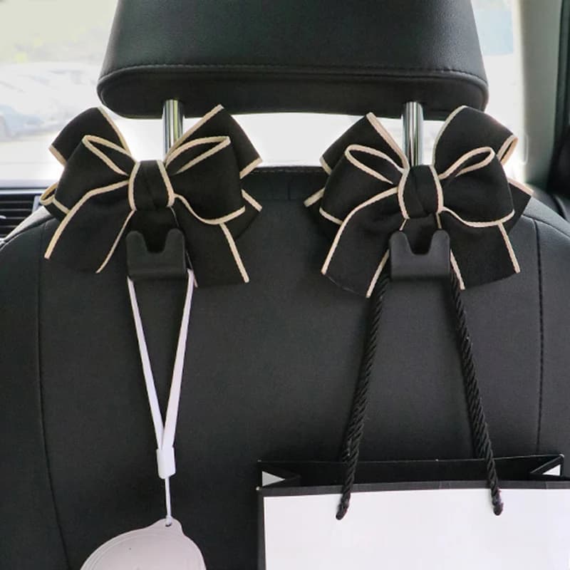 Creativo carino Bowknot seggiolino auto posteriore ganci di stoccaggio veicolo poggiatesta organizzatore gancio per borsa della spesa borsa accessori per auto