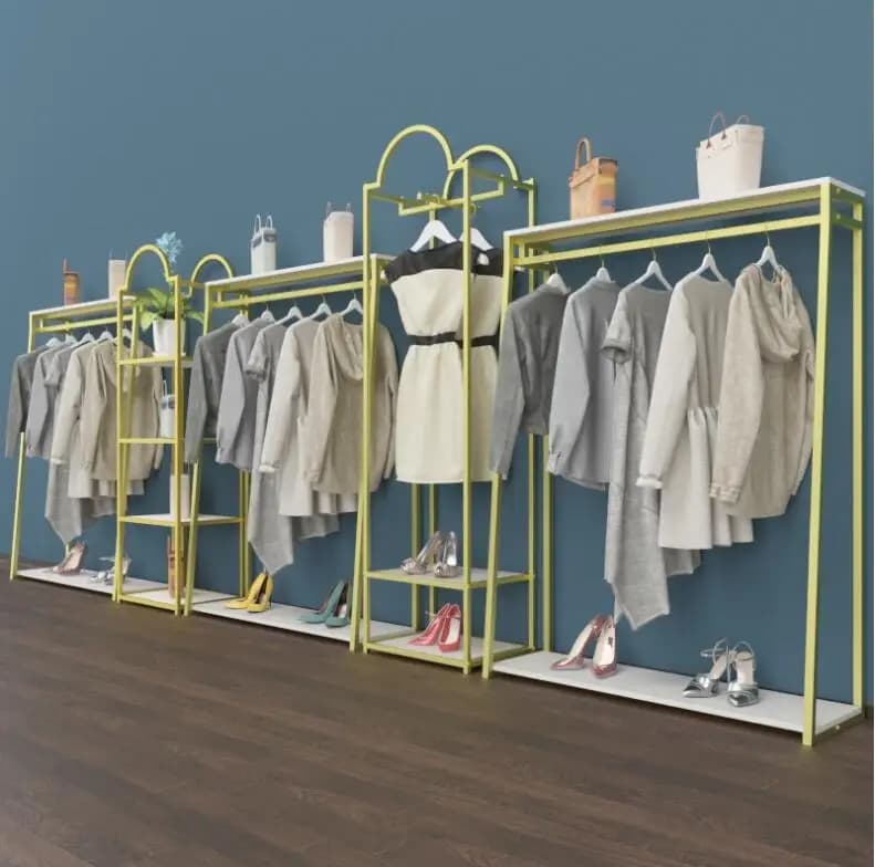 Clothes rack for women's clothing store display for shelves clothing store combined with floor to ceiling display in golden iron with spirit