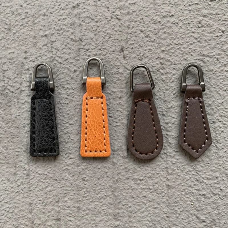 10 pz/set cursori con cerniera in pelle PU tirare la testa zaino accessori di abbigliamento per tirare la cinghia pendente cavo cerniera abbigliamento fai da te cucito