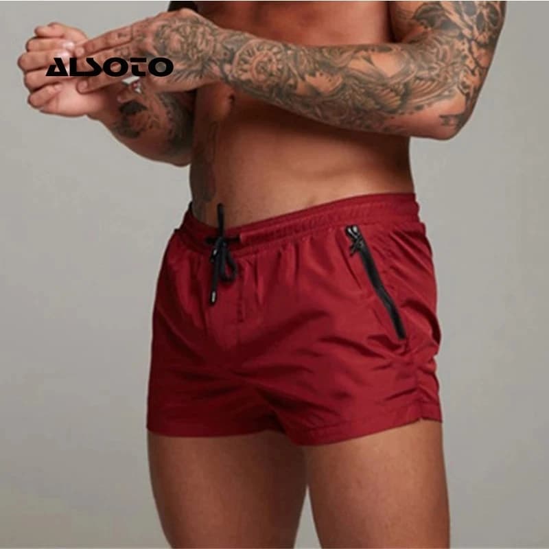 2025 Nuovo costume da bagno da uomo Costumi da bagno sexy da uomo Pantaloncini da bagno Slip da uomo Pantaloncini da spiaggia Tute sportive Pantaloncini da surf da uomo Costume da bagno