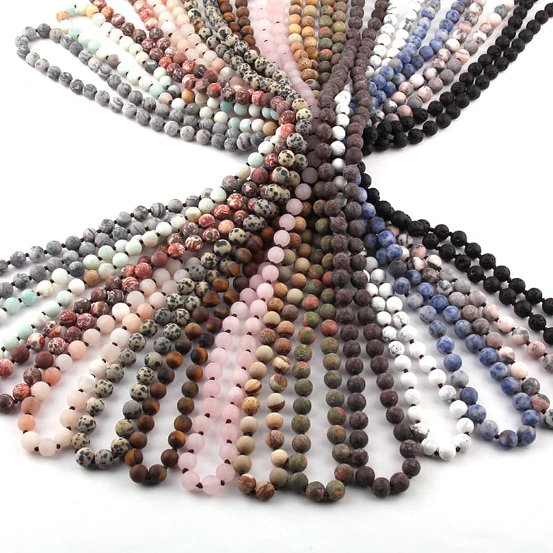 Fashion jewelry Long knotted necklace with semiprecious 8 mm satin matt stones
