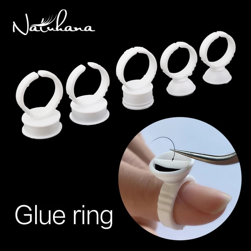 NATUHANA 100 Pcs Usa E Getta Estensione Del Ciglio della Colla Titolare Anello di Estensione Della Sferza Del Tatuaggio Adesivo Pigmento Pallet Titolari Anello