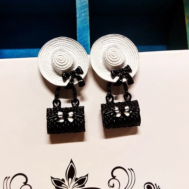 Women's Fashionable Design Fashion Style Pendant Earrings Black handbag matched with white cap for lady