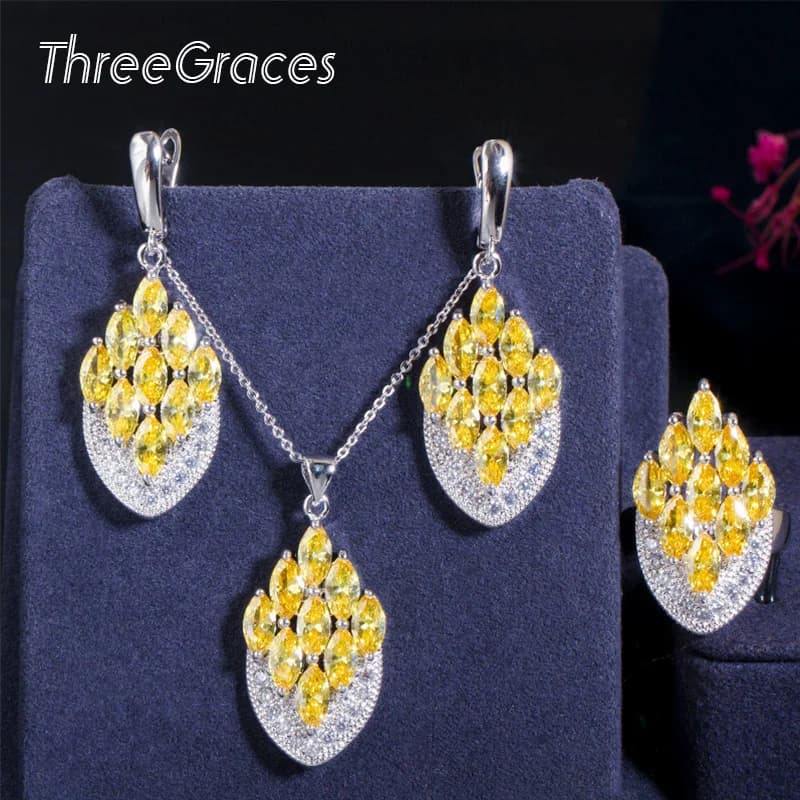ThreeGraces Naturale Giallo Chiaro Cubic Zirconia Argento Colore Unico Della Collana e Orecchini Set Anello di Donne Del Partito Dei Monili JS516