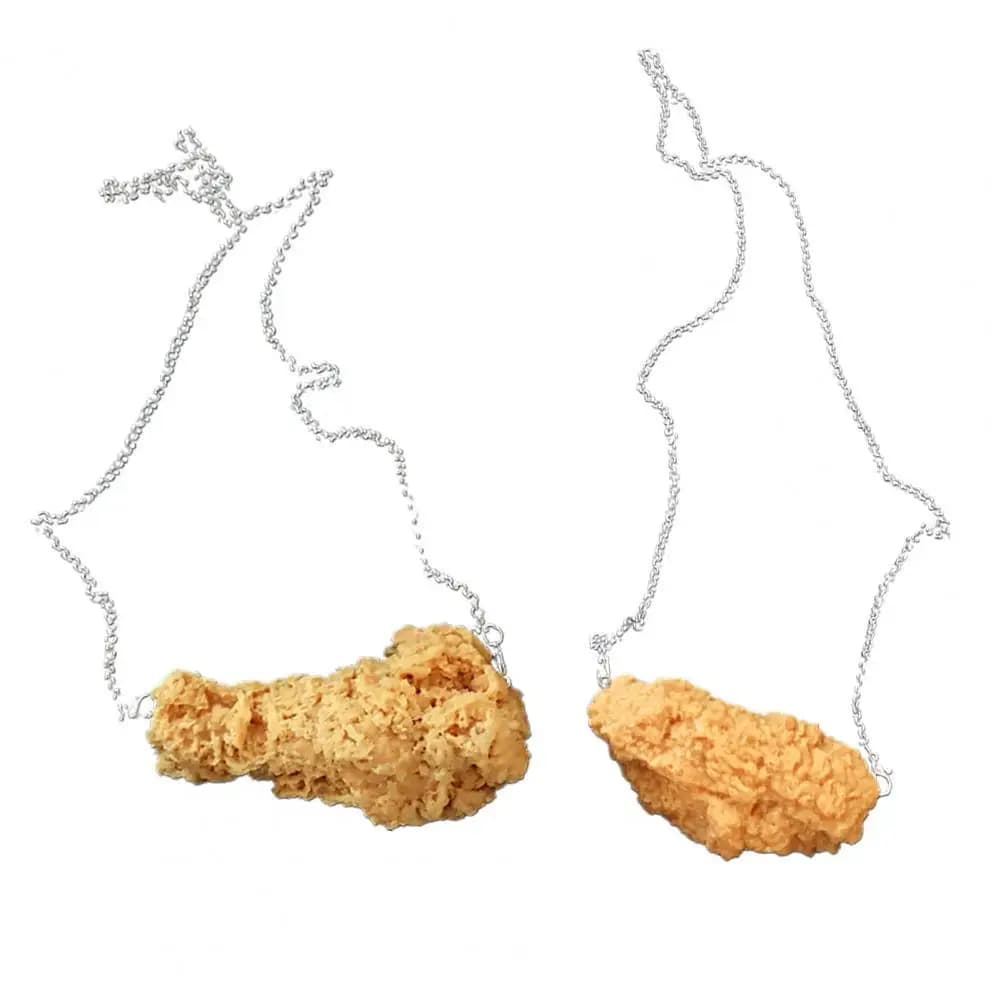 Ciondolo di pollo aspetto decorativo creativo giallo divertente fatto a mano simulazione cibo coscia di pollo abbinata ai vestiti