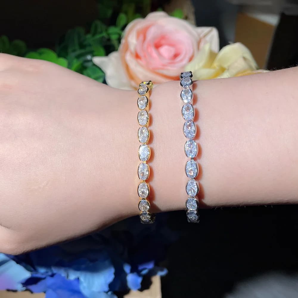 CWWZircons Braccialetti da tennis color oro con zirconi cubici ovali bianchi lucidi squisiti per le donne Accessori per gioielli per feste di nozze S0167