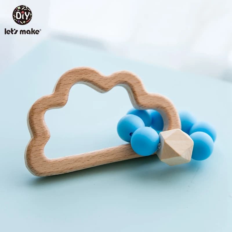 Cerchiamo di Fare 1pc di trasporto di Legno Giocattoli Del Coniglio Copertura Del Silicone Dentizione Del Bambino di Cura Del Bambino di Legno Del Bambino Massaggiagengive Silicone Culla Del Bambino sonaglio