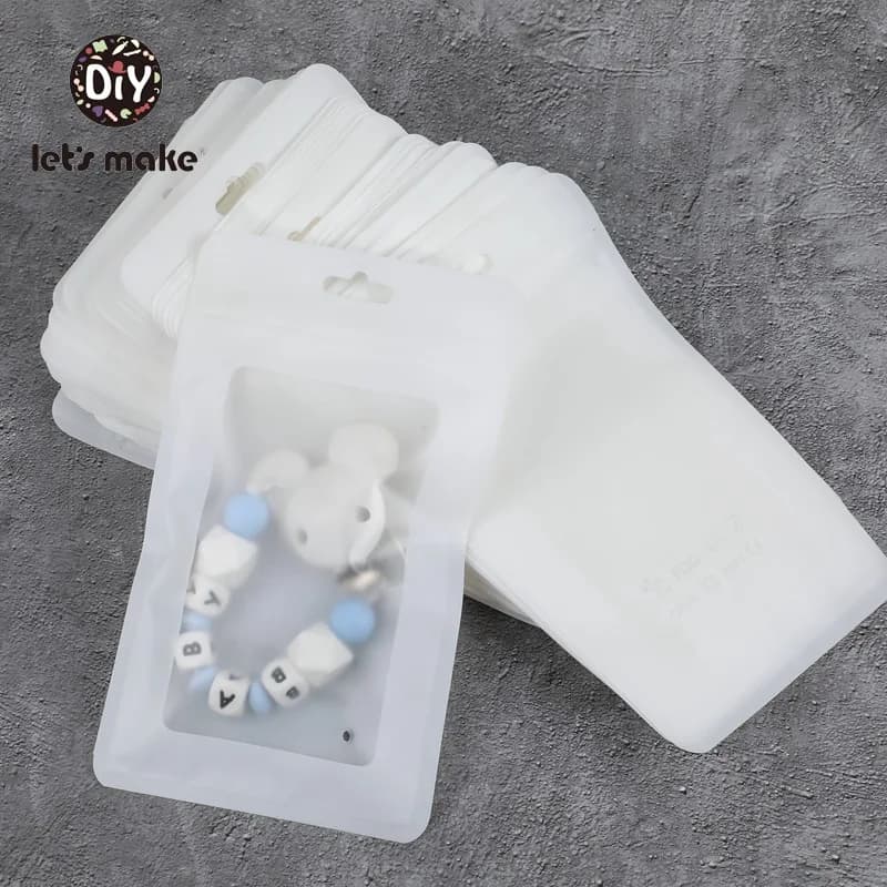 Cerchiamo di Fare i Sacchetti di Plastica Bianco 100pcs 19.5x11.5cm di Visualizzazione Borse BPA Libero Del Bambino di Perle di Silicone Cornici E Articoli Da Esposizione pendente dei monili Borse Massaggiagengive