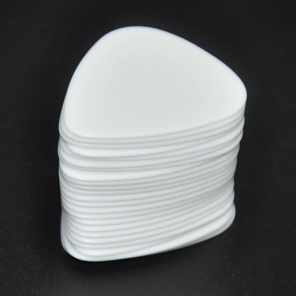Lotti di 100 pezzi di calibro bianco solido 0.60mm / 0.71mm / 1mm / 1.5mm Delrin plettri per basso plettri