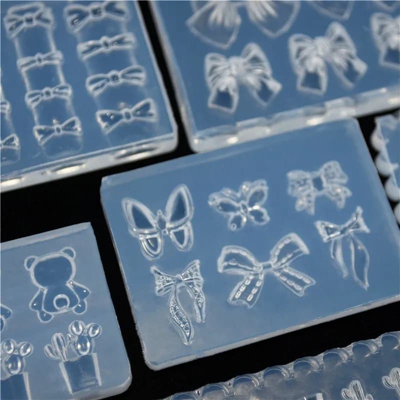 SNASAN Arco Piccole Perline Farfalla Cuore Nail Art Stampo in silicone Stampo per colata di gioielli Strumento Orecchini Stampo in silicone per resina epossidica UV