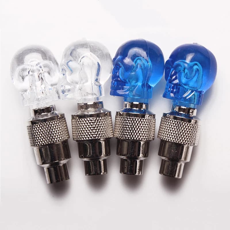 Luci per bicicletta con teschio Luce per valvola per bici Luce a LED attivata dal movimento Lampada da ciclismo di sicurezza Tappi per valvole per pneumatici Accessori per bici