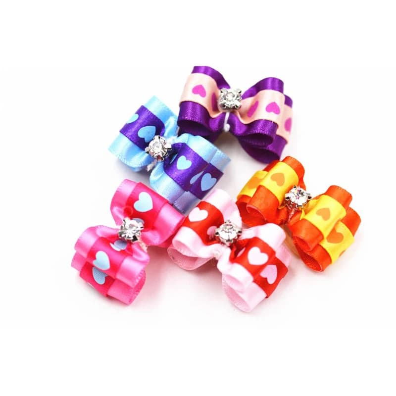 20/50/100 pz/Set prodotti per la cura del cane accessori per capelli fiocchi per animali decorazione per capelli diamante modello carino accessori per cani all'ingrosso