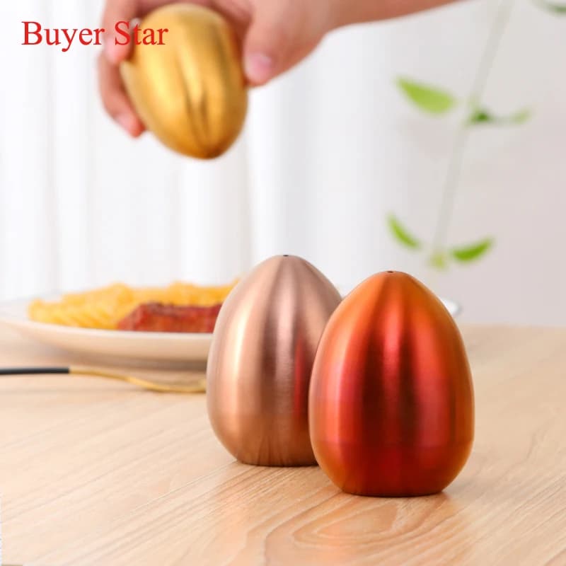 Set di barattoli di spezie a forma di uovo d'oro lattine di spezie in acciaio inossidabile contenitore di stoccaggio di spezie spray per condimenti da cucina strumenti agitatori di pepe