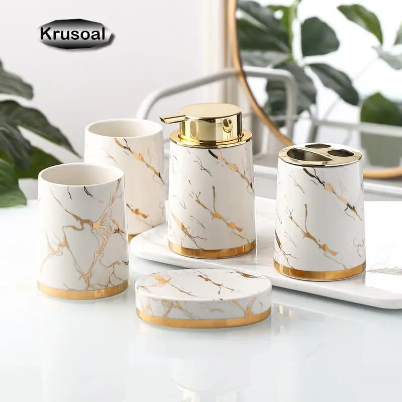 Set da toeletta in ceramica bottiglia di lozione marmorizzata spazzolino da denti collutorio portabicchieri scatola di sapone accessori per la decorazione del bagno un pezzo