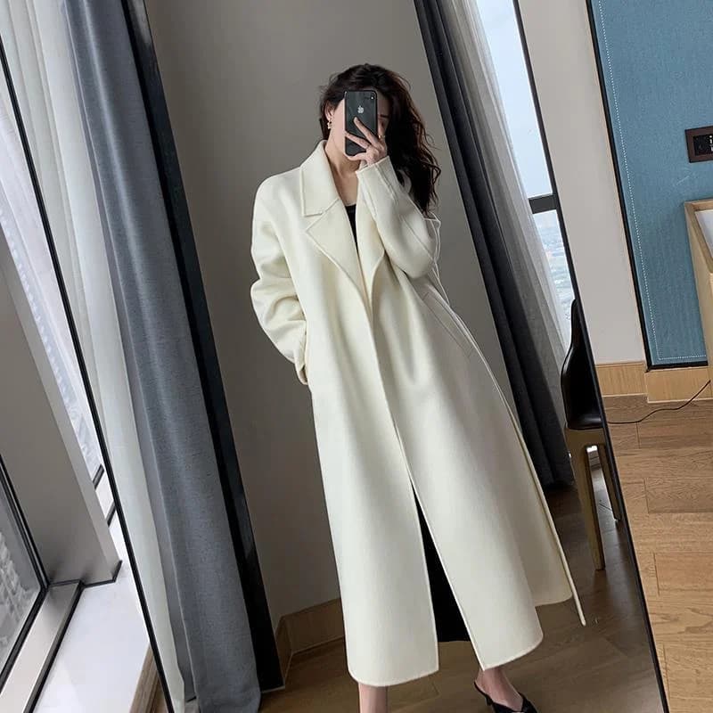 Cappotto di lana bianca donna autunno e inverno temperamento moda di fascia alta lunga spessa giacca a vento in lana mista cintura femminile 99
