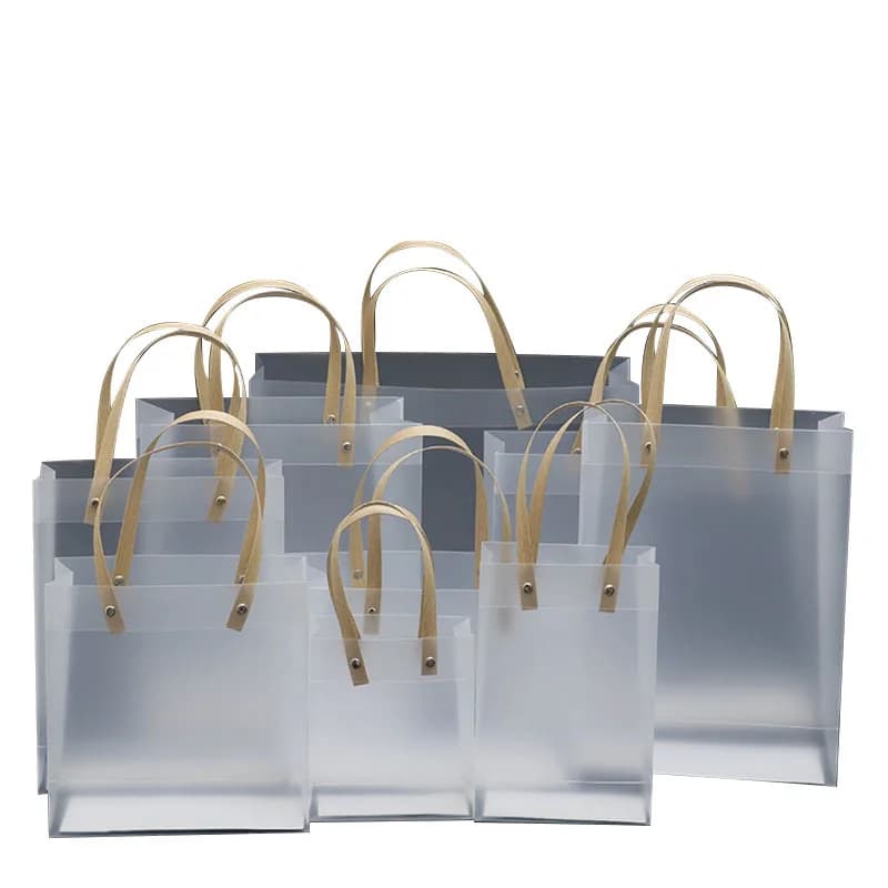 10/30 pezzi sacchetto regalo trasparente in PVC personalizzato con manici tote trasparente sacchetto di spesa in plastica satinata PP abbigliamento bevande imballaggio