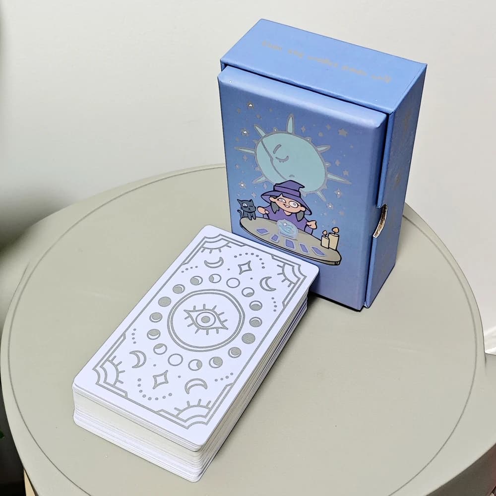 Il mazzo di tarocchi disegnato davvero cattivo in scatola rigida 78 pezzi di carte dei tarocchi divertenti stampate su cartoncino doppio goffrato da 350 g/m2 12 * 7 cm