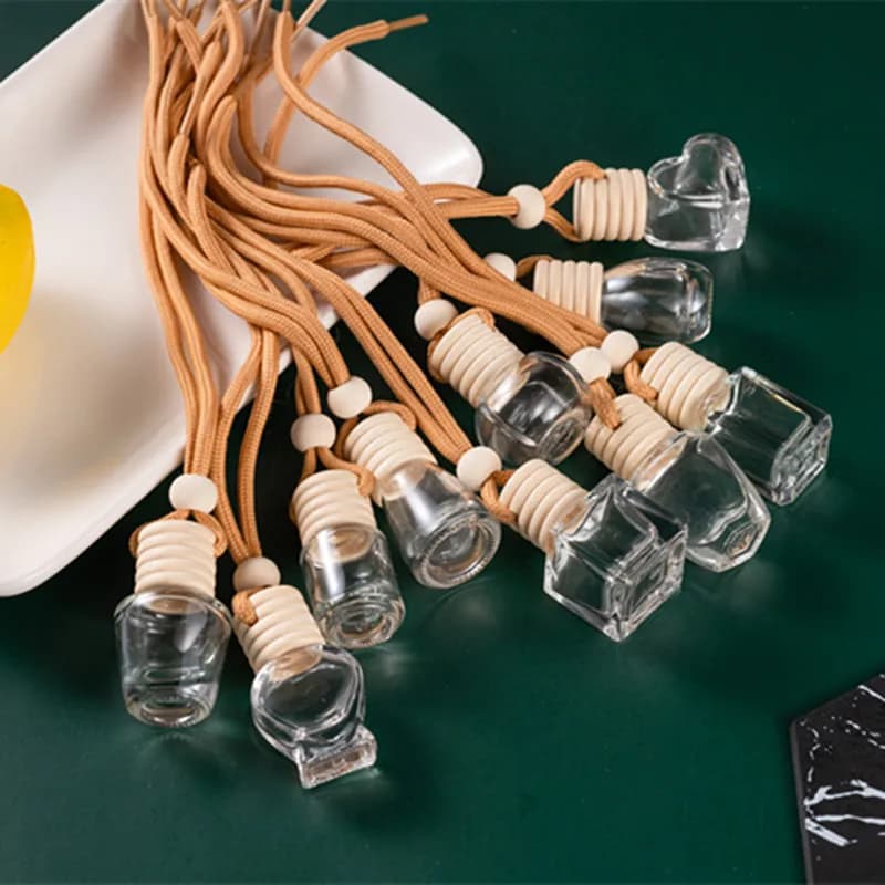 100pcs bottiglia per auto ciondolo diffusore appeso bottiglie essenziali per aromaterapia deodorante per ambienti interni mantenere la bottiglia di profumo