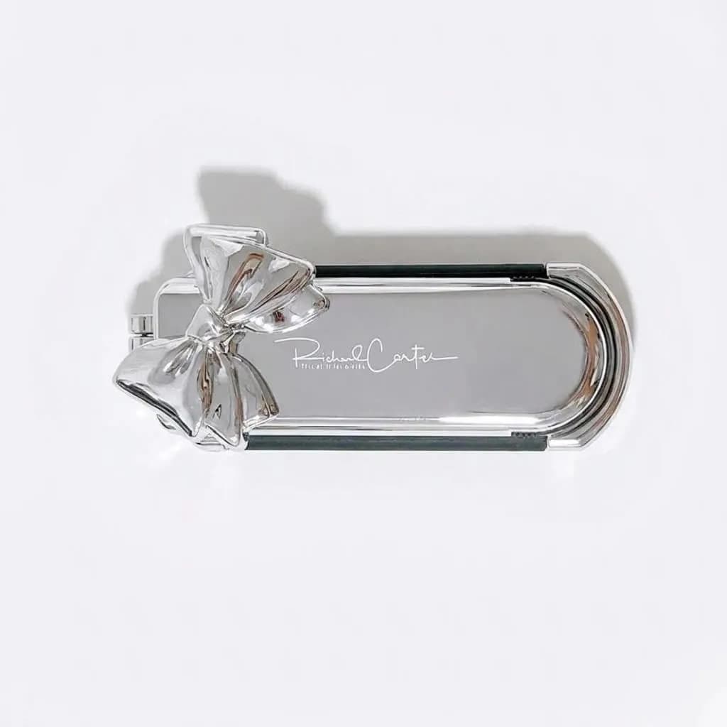 Spazzola per capelli pieghevole con specchio rimovibile, finitura argento con fiocco coordinato, per viaggi, uomo e donna, strumento per massaggio e styling