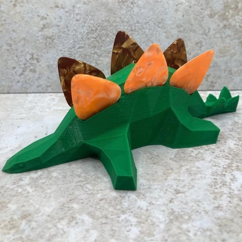 Supporto per plettro per plettro per chitarra-supporto per plettro per dinosauro/stegosauro stampato in 3D, regalo divertente e carino e decorazione per ripiano per chitarrista