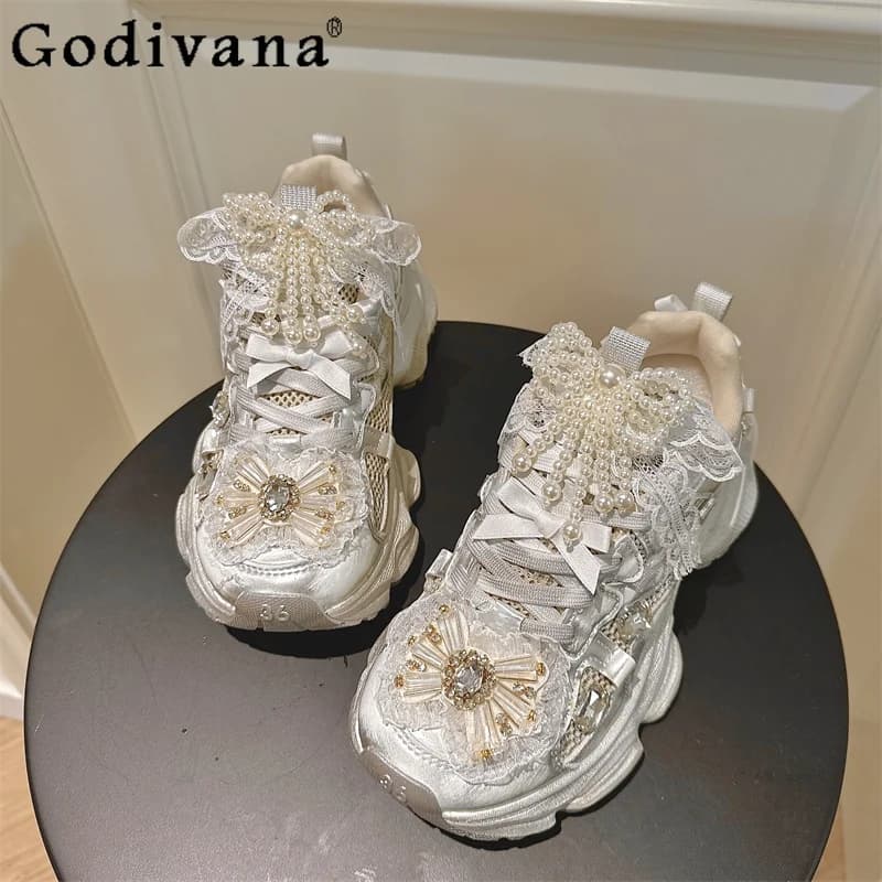 Sneakers robuste con suola spessa argento per donna Scarpe versatili con strass Bowknot in pizzo Scarpe da ginnastica bianche con piattaforma di moda femminile