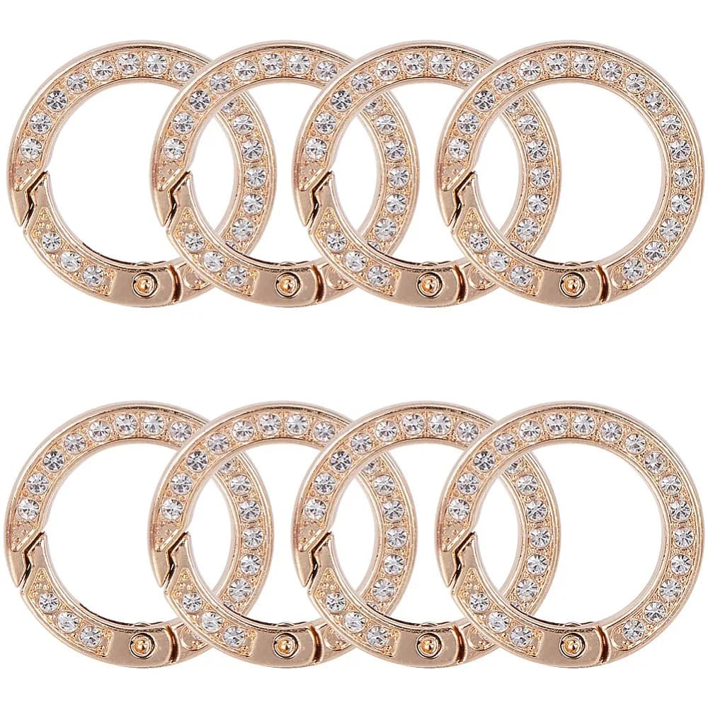 8 pezzi di anelli a molla in lega con strass, colore oro chiaro, 28,5x5 mm