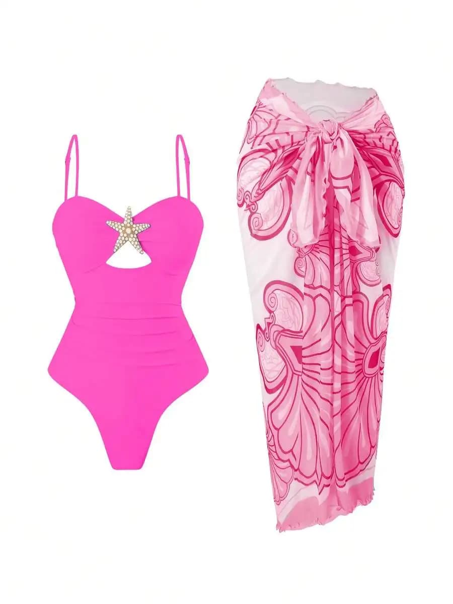Costume intero rosa shocking con decorazioni a forma di stella marina, arricciatura modellante per il controllo della pancia e gonna a fascia con stampa floreale abbinata