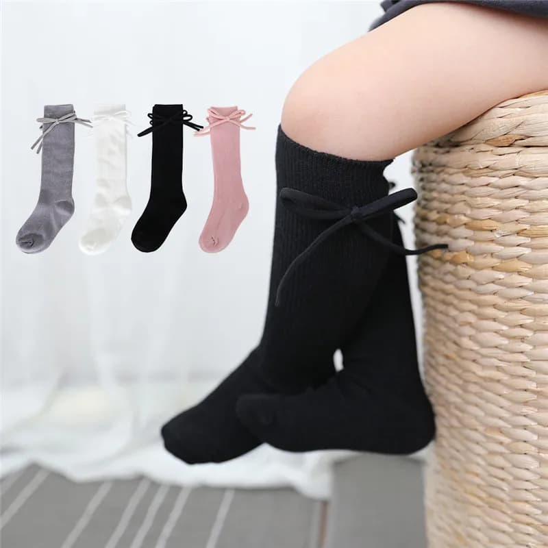 Autunno bambini calzini al ginocchio neonate Bowknot piatto calzino lungo morbido cotone solido bambini principessa Socken per 0-7 anni