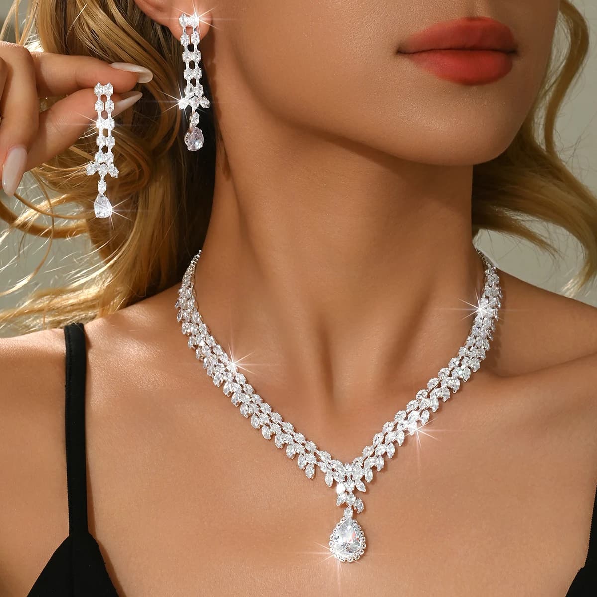 Versione coreana romantica delicata collana in argento orecchini braccialetto anello set di quattro pezzi versatili accessori per abiti da sposa