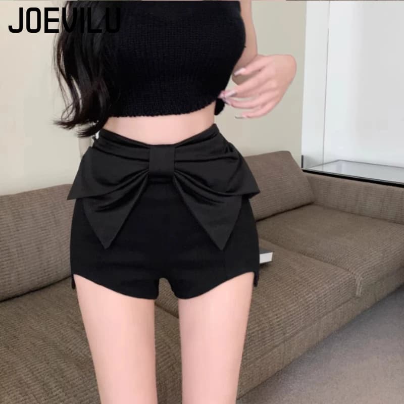JOEVILU Pantaloncini con papillon a vita alta Estate Nuovi pantaloni Hipster per ragazze speziate francesi Pantaloncini neri irregolari Abbigliamento da donna alla moda