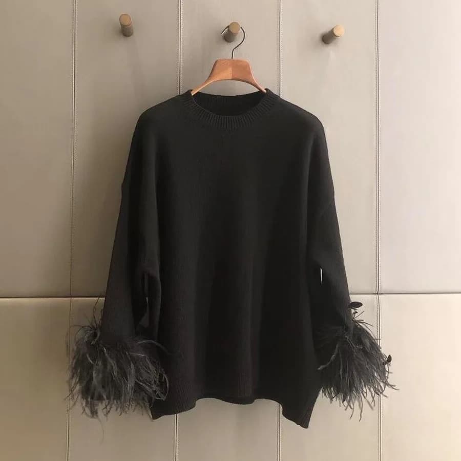 Maglione nero da donna con piume di struzzo a maniche lunghe girocollo pullover lavorato a maglia dolce top autunnale