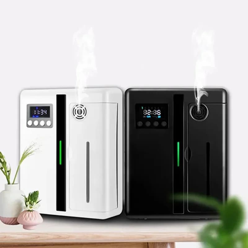 Oli essenziali Diffusore di aromi Macchina aromatizzante automatica con ventilatore all'interno per il deodorante per ambienti domestici con fragranza della stanza dell'ingresso dell'hotel