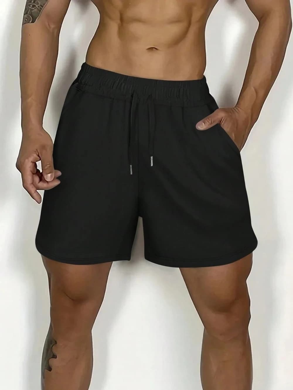 Pantaloncini sportivi da uomo a tinta unita con coulisse e tasche, casual, larghi, per fitness e corsa