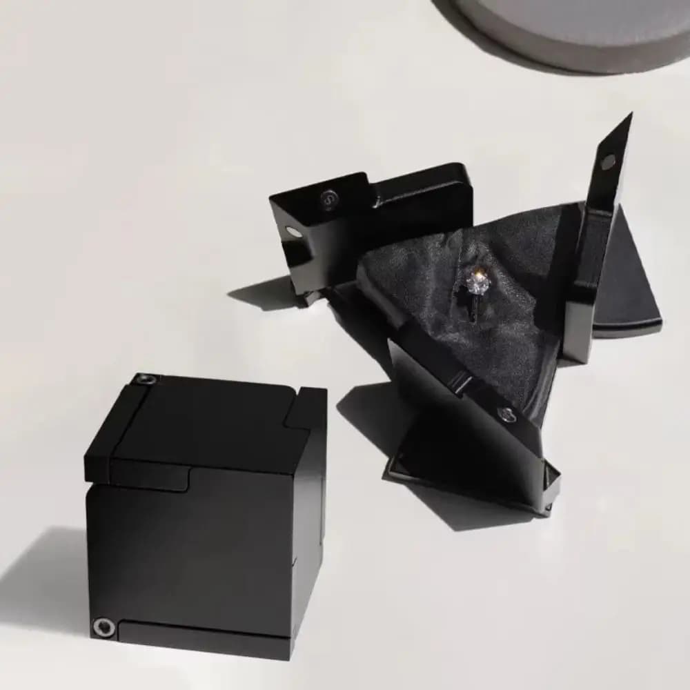 Nuova scatola per anelli di energia cinetica rotante Scatola per gioielli con deformazione meccanica portatile fredda Scatole per cubetti Scatola per gioielli