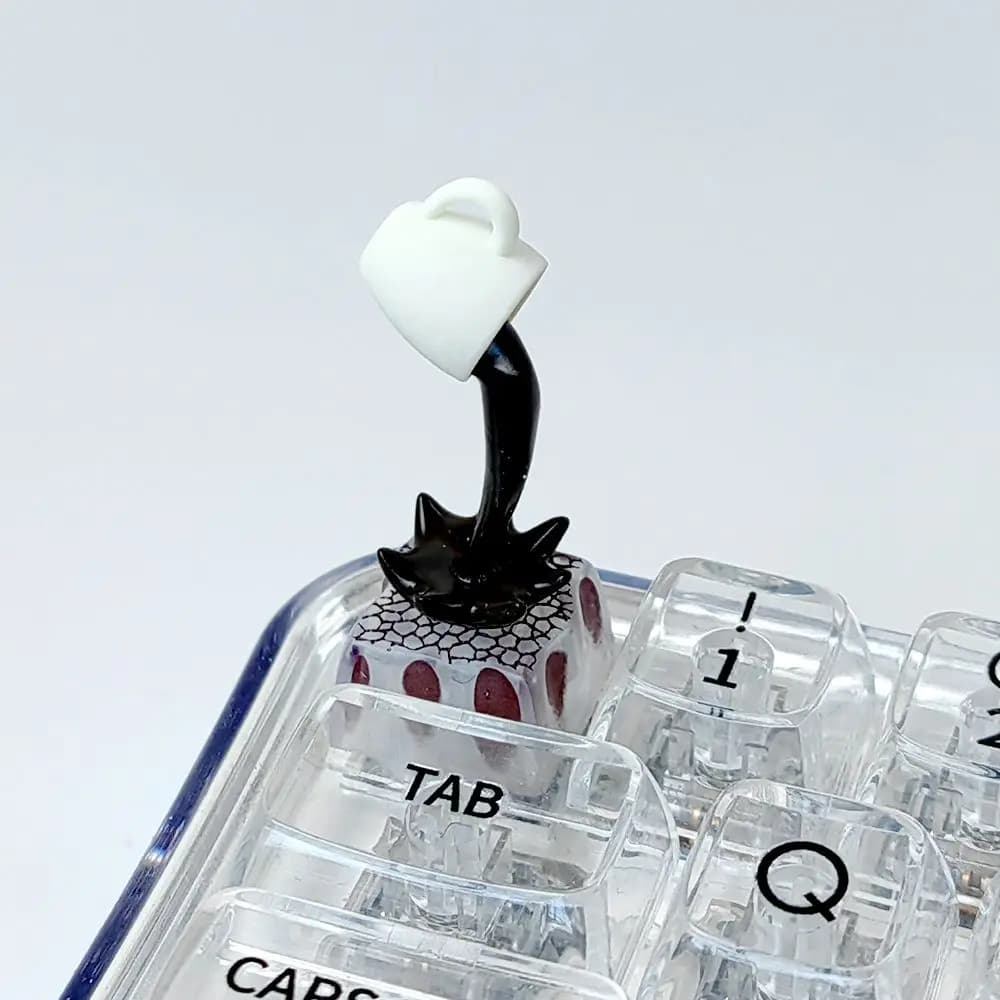 Flow coffee, copritasti personalizzati, design a separazione magnetica, tastiera meccanica, trasmissione luminosa con copritasti in resina ad albero trasversale