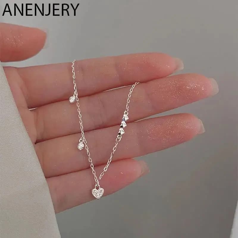ANENJERY bracciale a forma di cuore d'amore Color argento bracciale a catena a maglia con zirconi a forma di cuore delicato per gioielli da regalo di compleanno per ragazze da donna