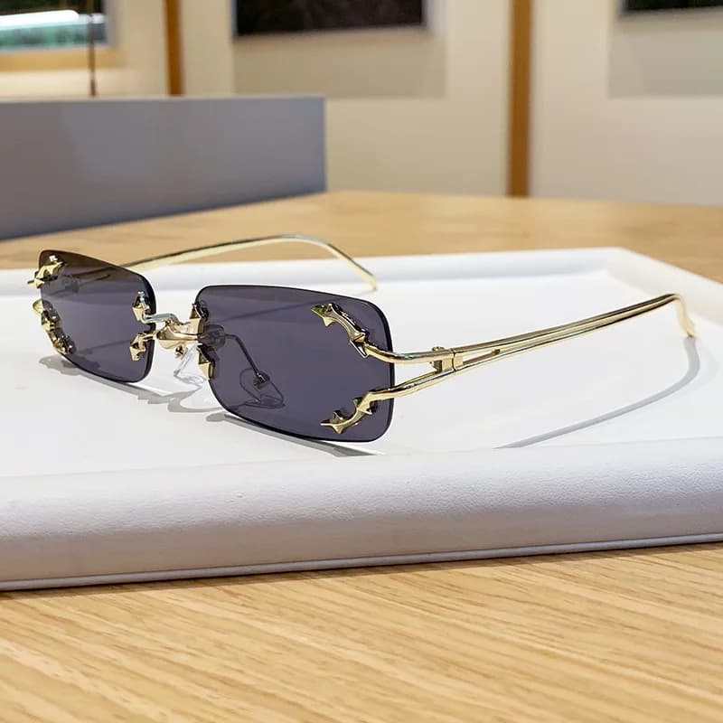 Rimless glasses men's and women's high-end sense ruffian handsome fashion sunglasses water silver rimless GM sunglasses