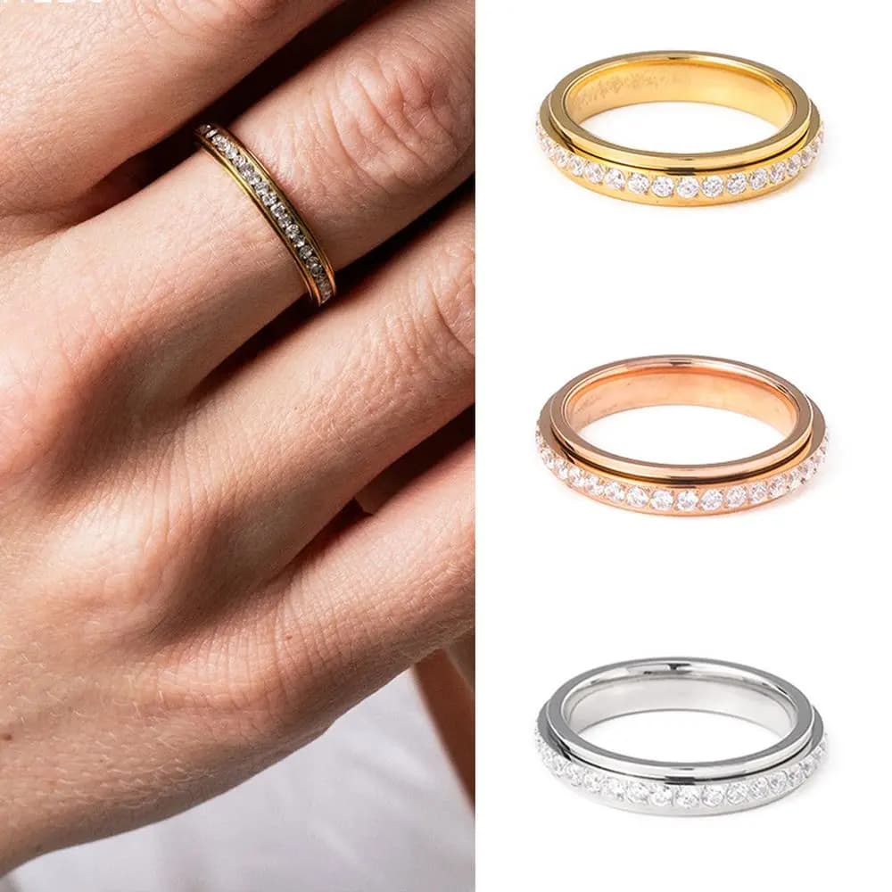 CARLIDANA Anello rotante con dito rotante Spinning Fidget Anti ansia Anello nuziale da donna in acciaio al titanio con zirconi placcati in oro