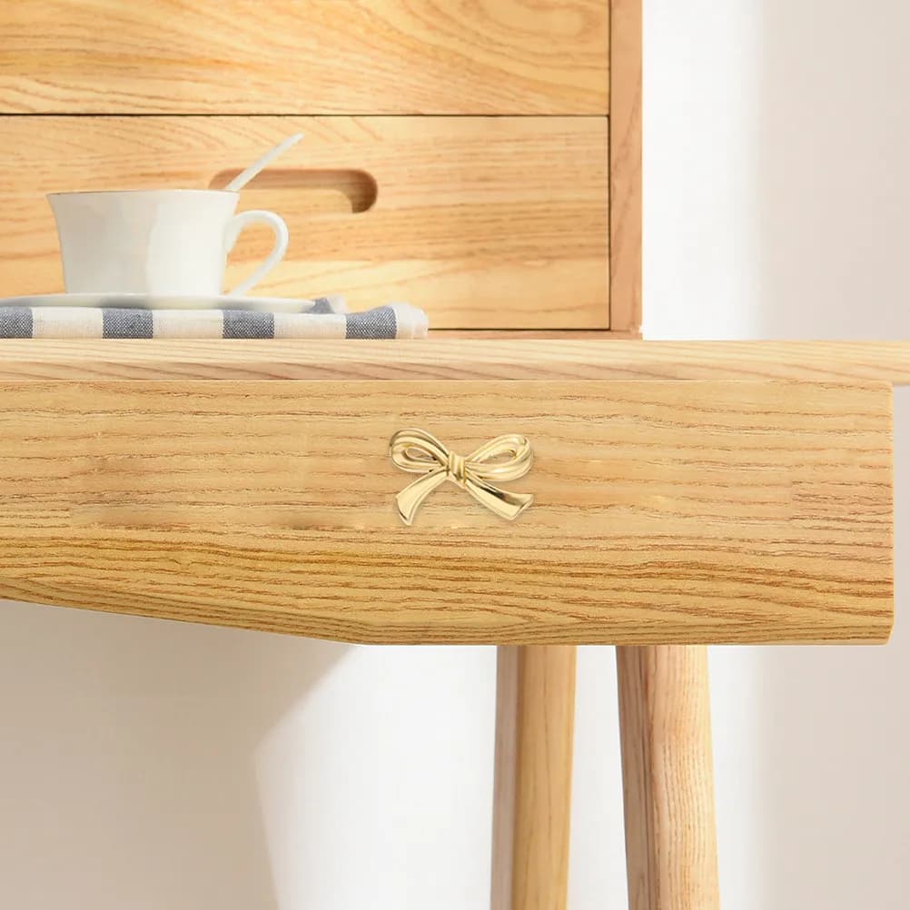 4 pomelli per armadietti a forma di fiocco in ottone, maniglie a fiocco per ante di armadi, cassettiere, mobili e librerie