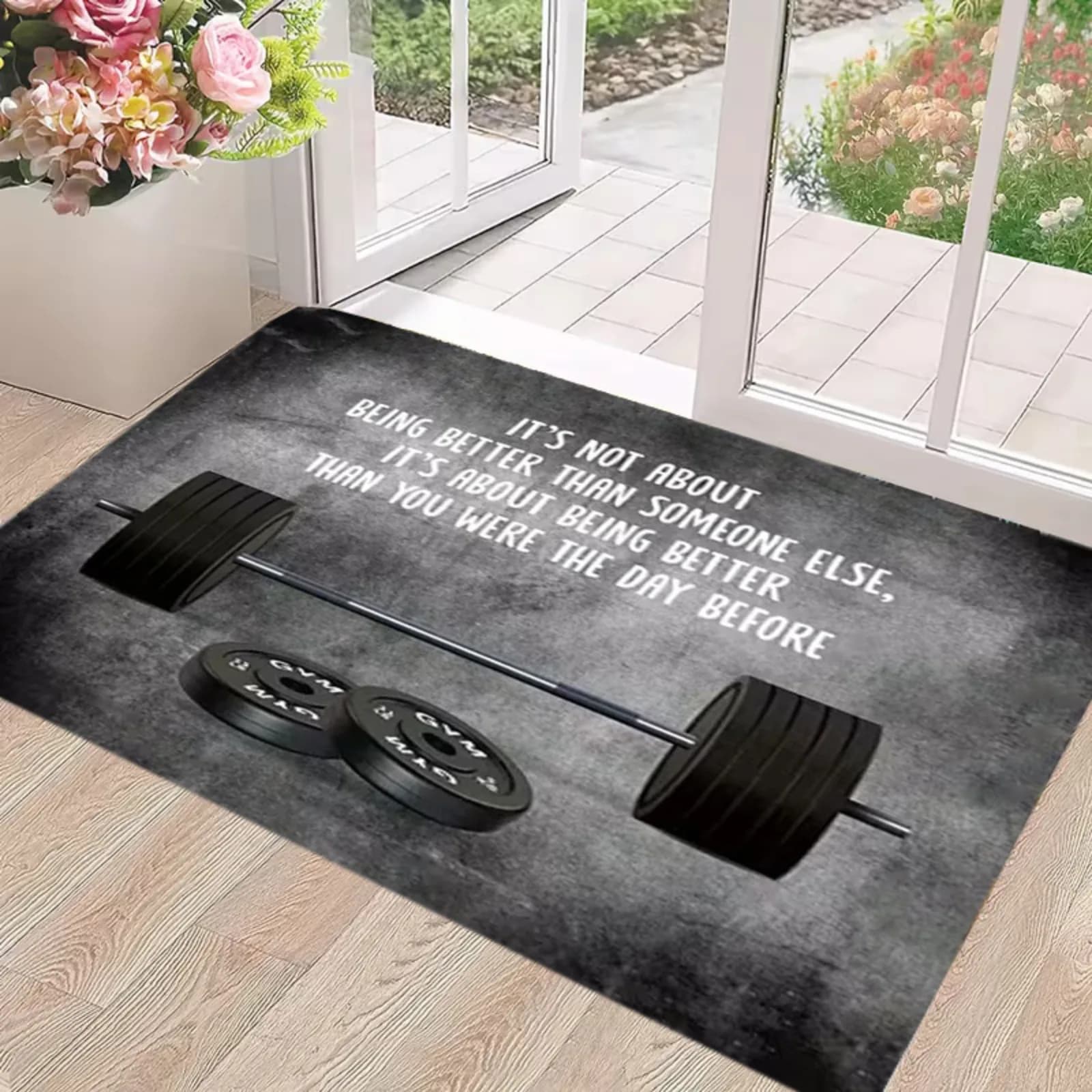 1pc Outdoor Doormat Featuring a Barbell and the Motivational Quote "IT's NOT ABOUT BEING BETTER THAN SOMEONE ELSE, IT's ABOUT BEING BETTER THAN YOU WERE THE DAY BEFORE." Made of High-quality Flannel Mat, Suitable for Doorways, Living Rooms