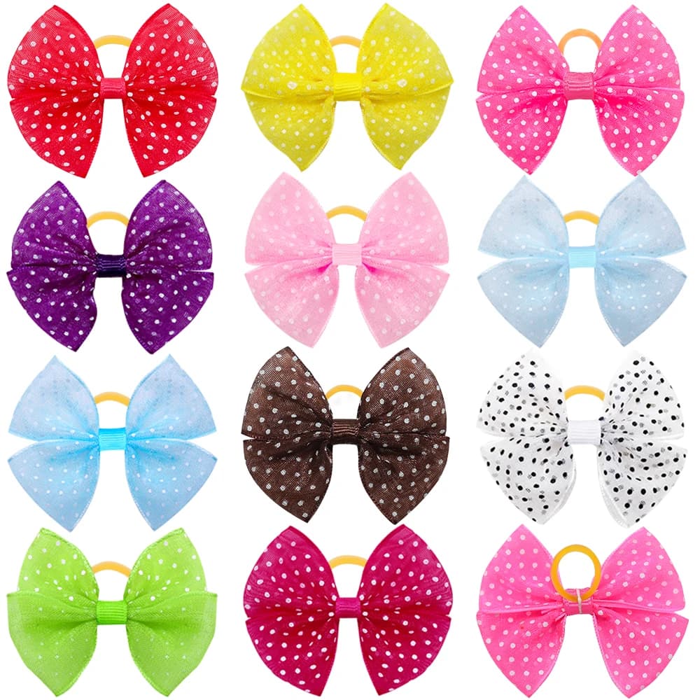 12PCS Archi per capelli per cani in pizzo con elastici per peli di cani punteggiati Toelettatura colorata Bowknot per peli di cani per cuccioli Prodotti per animali domestici Articoli per animali domestici