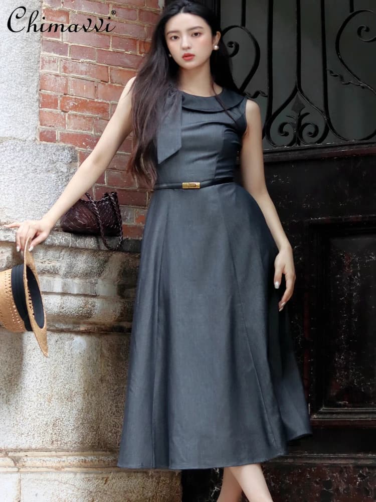 Francese di fascia alta vintage stile Hepburn girocollo fiocco senza maniche cintura a vita alta sottile temperamento a-line abito lungo grigio per le donne